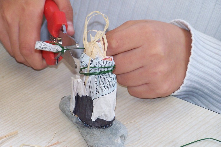 La femme sur la pierre